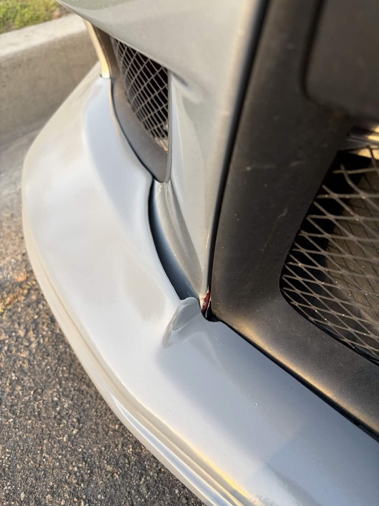 fitment issue around lower corners of main grill