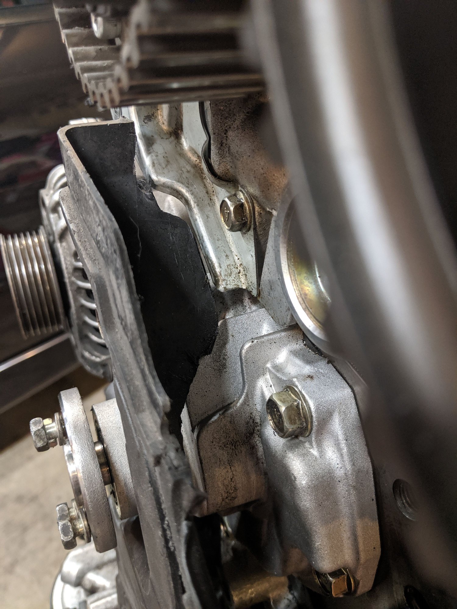 Evo 8 vs 9 lower timing belt cover, any better for a 2.4? EvolutionM