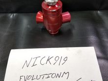 Note: there is a small wear mark near the topside by the adjuster screw.