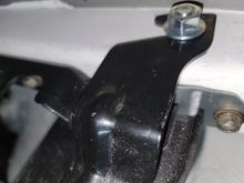 cut the bracket, leaving just one 'hook'. the hole will need to be adjusted to match the hole already on the car's frame. the bolt is 1/2" 3"long
