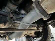 Downpipe mounted to hangers