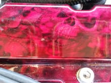 My valve cover on my IX-MR is powdercoated, with hydrographics, and is 2-3 years old, and NO signs of yellowing, or fading.
