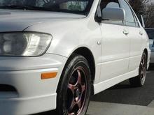 This was coming home from my first meet with her. There were three white cars in a row at a stop light. Mine, my friends Miata, and a WRX we met up with to take pictures. This became Ghost's main photo, showing her Chameleon rims perfectly.