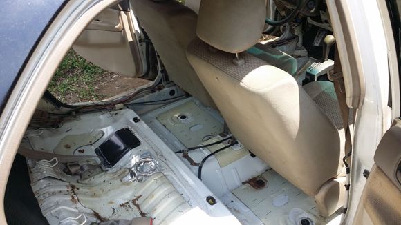 This is what's riding for now until the carpet project is complete. This gives me a chance to vacuum/clean dirt and grit from the bare metal...and learn a little more about what's going on under all that interior comfort lol