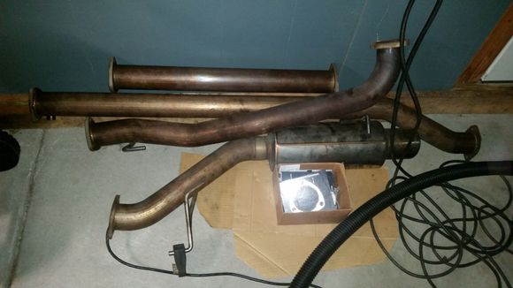 Disassembled exhaust. Old hardware was rusted and beat up. Have new hardware and gaskets.