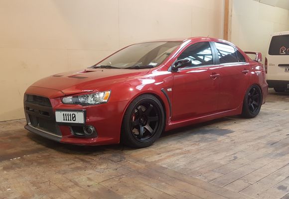 Rota Grid's 18x9.5 +18 in Matt Black wrapped in Falken 265/35 RT615K semi slicks. Lowered on BC adjusties.