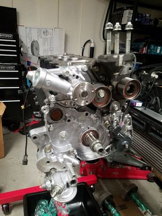 Water pump, cylinder block bracket, timing tensioner arm