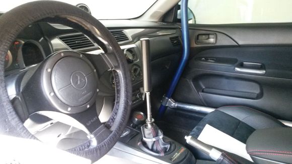 Here is mine. I know it's not for everyone. But you can see how close it is to the steering wheel. It works like a charm. I have tried them all. Started with AMS, etc. and found this works best for my use.