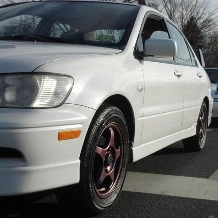 This was coming home from my first meet with her. There were three white cars in a row at a stop light. Mine, my friends Miata, and a WRX we met up with to take pictures. This became Ghost's main photo, showing her Chameleon rims perfectly.