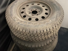 Various steel rims with part worn tyres