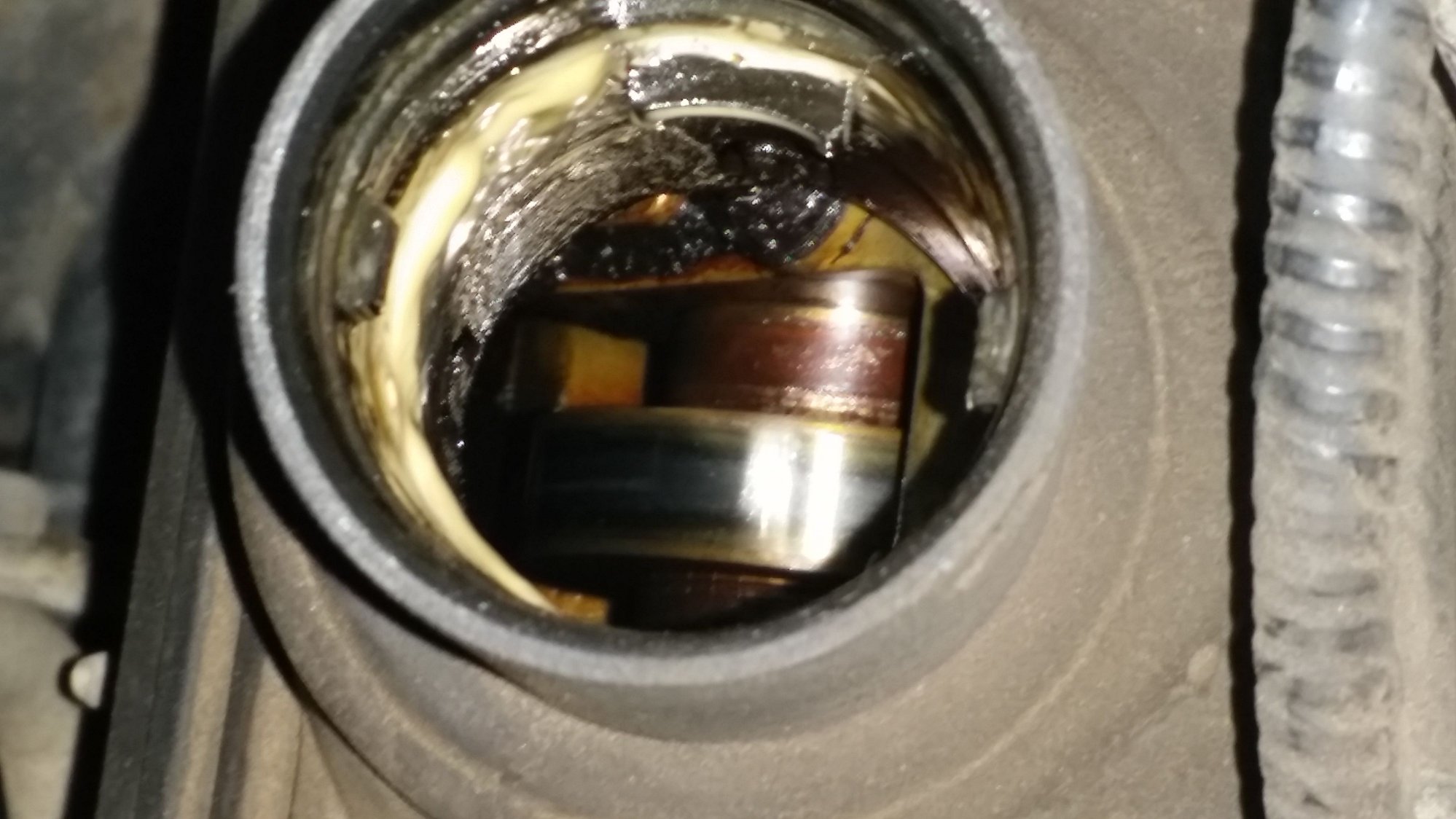 Possible blown head gasket. What else could cause milky oil cap Ford