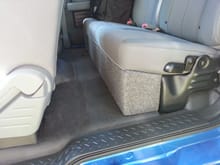 Under seat box built from 1x8 board and wrapped in indoor outdoor carpet