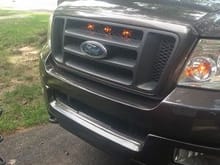 added 3 amber lights in the grill like the raptor