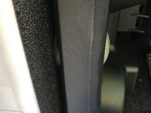 Shows the black plastic sleeve between extender and truck body