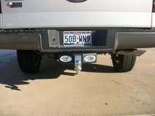 Reverse lights mounted on the hitch (Has a toggle switch for manual on, off, or reverse on)