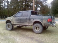 My old green 01 supercrew with a 6&quot; fabtech lift and leveling kit on 38&quot; super swampers (god i miss that thing)