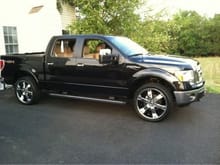 This is my truck after 2 weeks. Added rims, some chrome accent, hard folding tonneau cover and tinted windows.