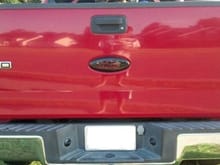 Smoked Tail Lights and Custom Painted Oval Emblem
