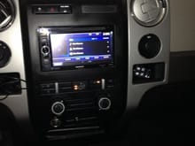 Kenwood doubledin deck, 6 inch screen, touchscreen, and DVD.10 inch JL w1 and Memphis amp in the back seat.