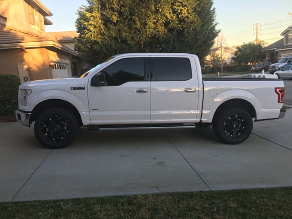 Removed air dam, husky x act contour mats front and rear, husky wheel well liners, 2.5" level kit, 33x12.5 Atturo trail blade xt, 20" fuel hostage