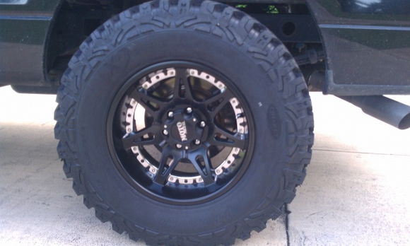 Moto Metal 961's 18x10 wrapped in 35&quot; ProComp Xtreme mud terrians
