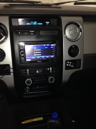 Kenwood doubledin deck, 6 inch screen, touchscreen, and DVD.10 inch JL w1 and Memphis amp in the back seat.