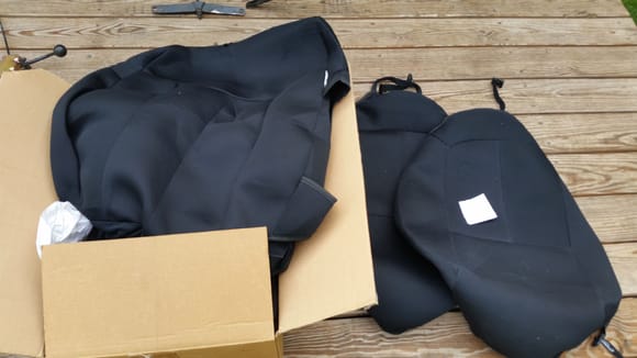 Cover kings for bucket seats - black only installed the bottoms. Top and head rest brand new in the box $65set
