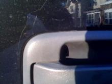 Scratches, possibly where thieves broke in.