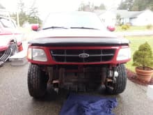 Took the bumper off to put the brackets to the grille guard on.
