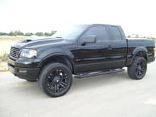 new black paint on truck   blacked out '09 emblems