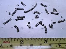 This crap was found in my pan after the 4R100 complete stopped working-no reverse,no forward.  Sounded like an electric drill when I tried to give it gas.  tranny shop said my old tranny had "burnt direct clutches, damaged center support, forward drum stripped out, damaged pump gears &amp; worn sprags!"