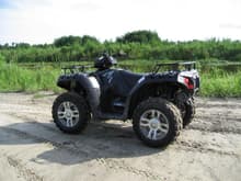 850 XP Polaris, twin cyl. 70hp and will hit 70 mph