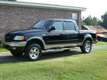 My current ride...

2003 F150 Supercrew FX4 Lariat

Stock as can be
