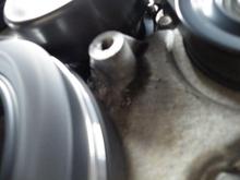 the nub to the right of the crank pulley I had to grind some material that was tearing up the back of the metco pulley and belt.