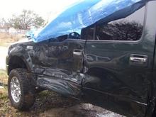 girl lost control in rain and came across and hit me going 65mph