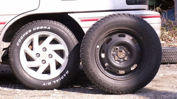 Comparison of the two tires. The Cobras are on stock Tracer LTS rims, the Weathermaster's are on stock steel rims.