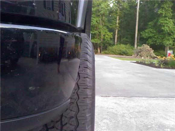 stock tires sticking out about half inch