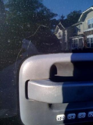 Scratches, possibly where thieves broke in.