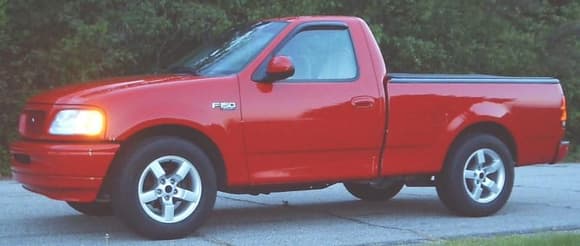 '98 F150 STX. It had the 4.6 with a 5-speed manual. I added a Magnacharger supercharger, among other things. Had a lot of fun and learned a lot with this truck.