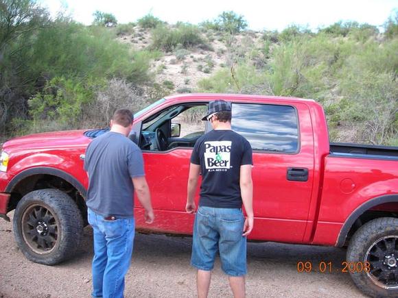 Me and my buddy looking at the new truck after its first hill!!!