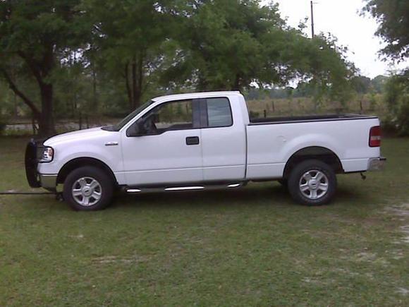 before rims, leveling kit, exhaust black out tails, tint