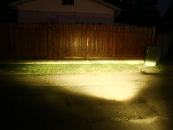 The cut off with only one fog light at about 10 feet.  Nice wide and flat cut off, perfect for the bad weather.  You can see the cut off just below the fence on the cement foundation.