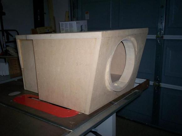 angeled 
Description:  this is a look of the center box as it will rest in the truck. the second speaker is down firing. the front will fore foward into the dash.