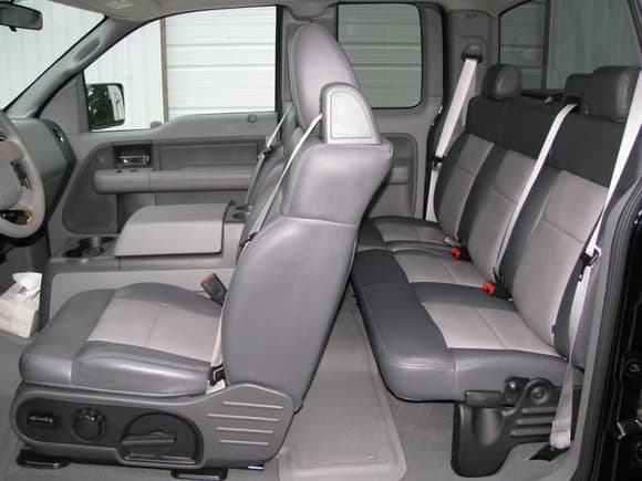 Leather (Katzkins) seats front &amp; back
Console instead of jumpseat