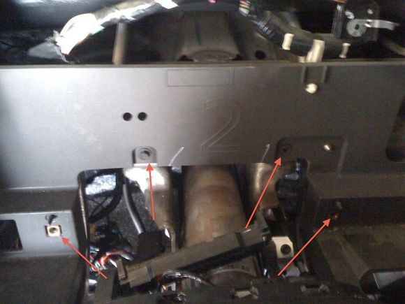 this is what it looks like after you take the instrument cluster out and these bolts need to be removed and any other that i may have missed that you can see attach to the steel frame behind it