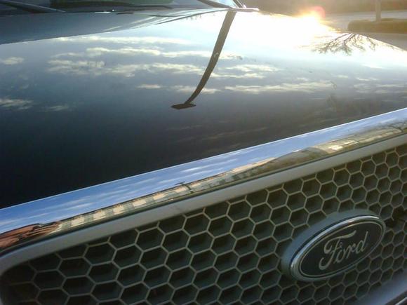 Chrome Grill Surround slightly dented.