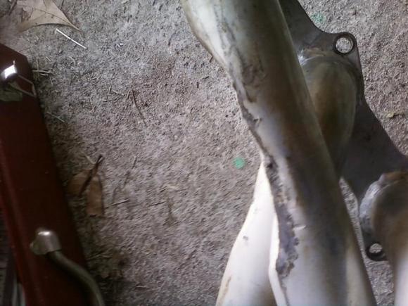 this is how bad the primary tube had to be beat in to clear the motor mount