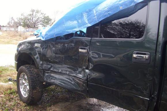girl lost control in rain and came across and hit me going 65mph