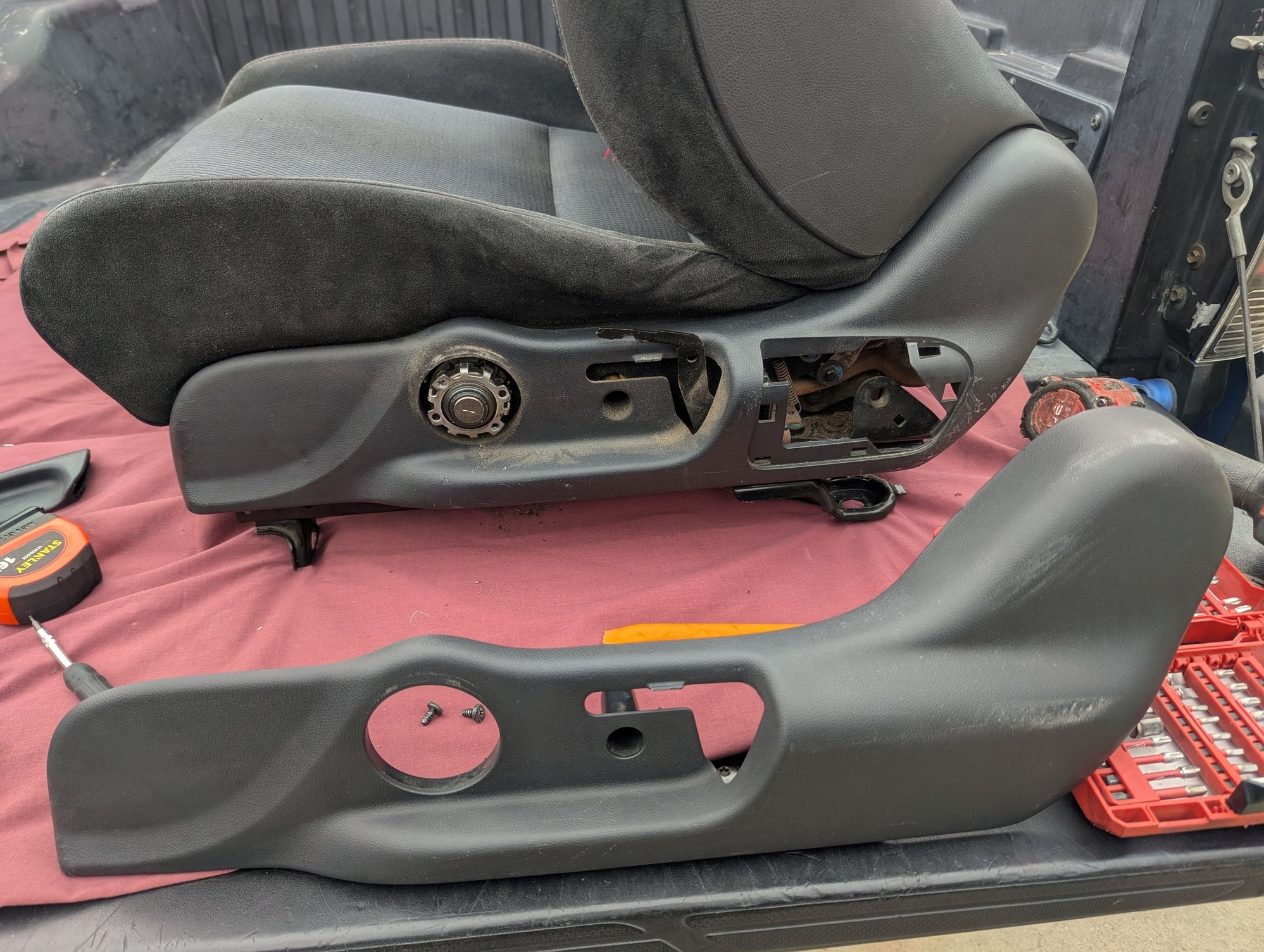 I had found this plastic seat cover at the wrecking yard as well, without the hole for the seatbelt. 8th Gen Civic SI coupe and sedan seats have different plastics.