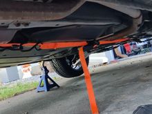 Used a front chassis bar as a pull point for my ratchet strap.